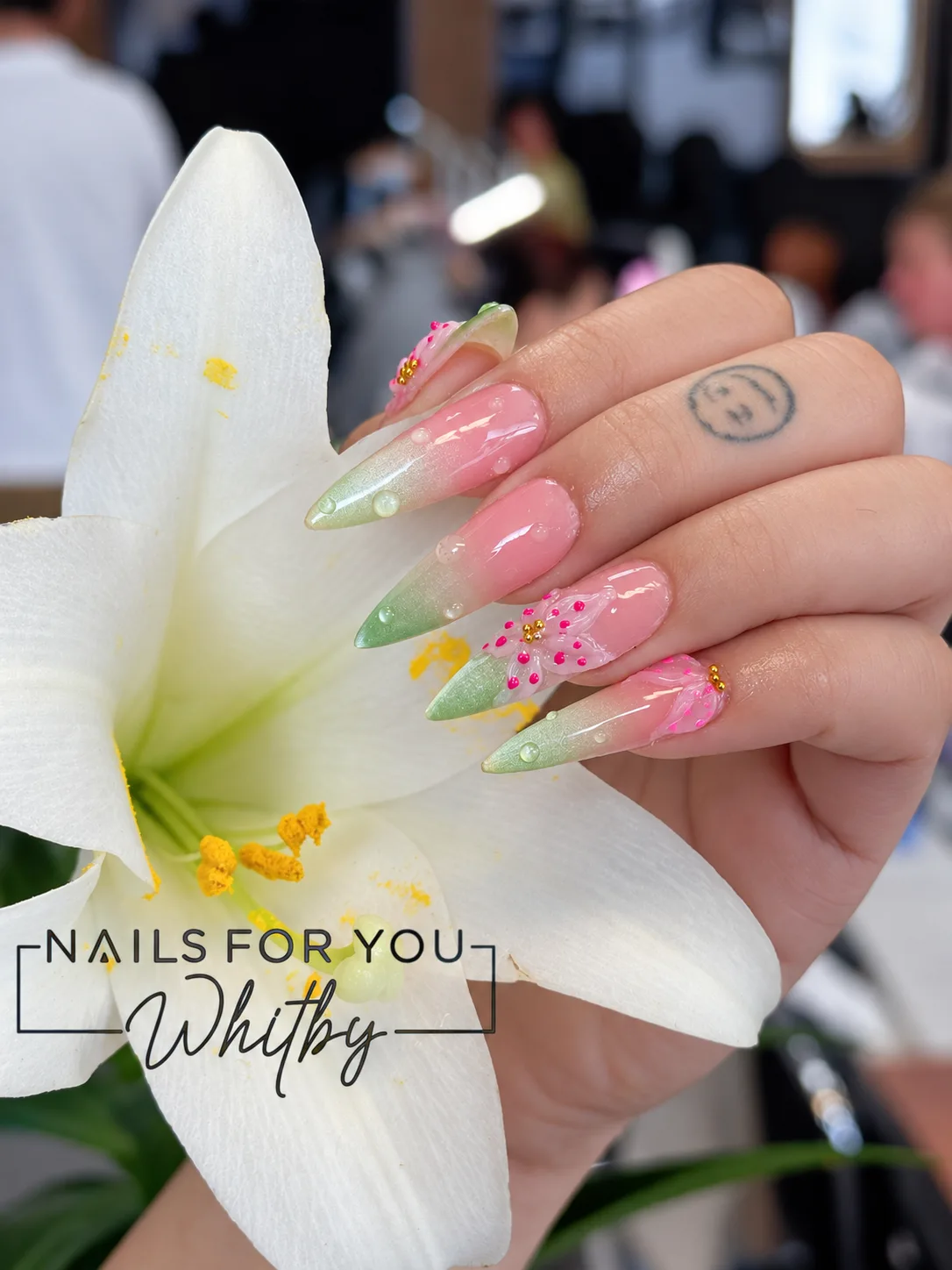 Pink and green floral nail art by Nails For You Whitby